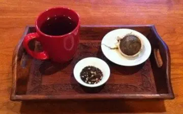 chai tea in red glass
