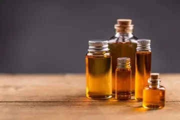 six bottles of essential oils in various sizes