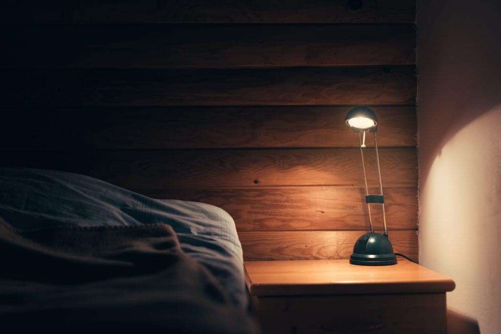 bedroom at night, light on bedstand good night sleep